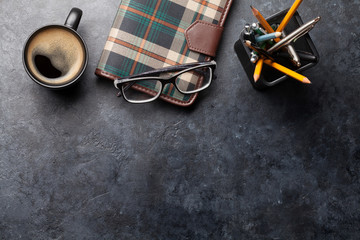 Office desk table with notepad and coffee