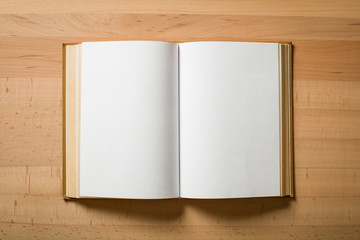 Opened book with white sheets