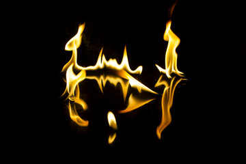 blank postcard fire dance on a black background with reflection