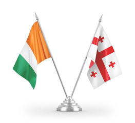 Georgia and Cote d'Ivoire Ivory coast table flags isolated on white 3D rendering