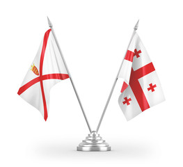 Georgia and Jersey table flags isolated on white 3D rendering