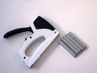 Construction stapler. Widely used in repair works