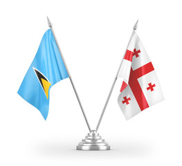 Georgia and Saint Lucia table flags isolated on white 3D rendering