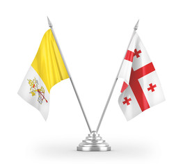 Georgia and Vatican table flags isolated on white 3D rendering