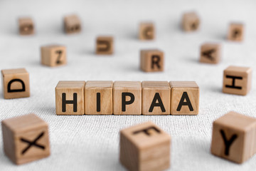 HIPAA - words from wooden blocks with letters, Health Insurance Portability and Accountability Act HIPAA concept, white background