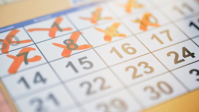 Time runs the concept, the red marker marks in the calendar of the past days
