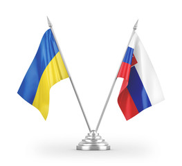 Slovakia and Ukraine table flags isolated on white 3D rendering