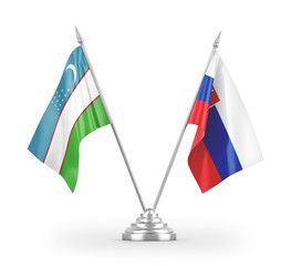 Slovakia and Uzbekistan table flags isolated on white 3D rendering