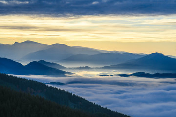 Zalla Valley covered with fog with Mount Gorbea at sunrise