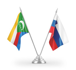 Slovenia and Comoros table flags isolated on white 3D rendering