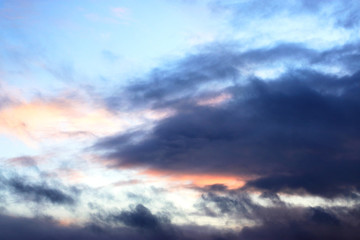 a storm covers the sky in darkness, a beautiful sky is covered in black clouds