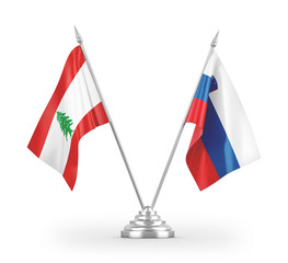 Slovenia and Lebanon table flags isolated on white 3D rendering