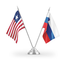 Slovenia and Liberia table flags isolated on white 3D rendering