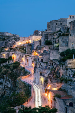 Matera, European Capital of Culture 2019. Old town listed as World Heritage by UNESCO, Sasso Barisano at night, Basilicata, Italy