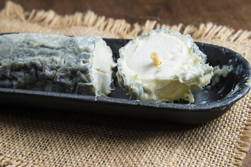 Savory goat cheese on burlap background