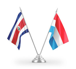 Luxembourg and Costa Rica table flags isolated on white 3D rendering