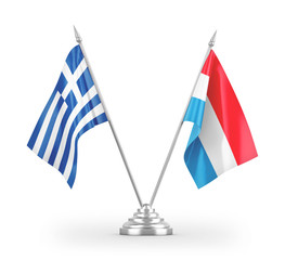 Luxembourg and Greece table flags isolated on white 3D rendering