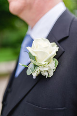 groom suite wedding boutonniere white rose