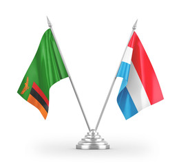 Luxembourg and Zambia table flags isolated on white 3D rendering