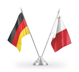 Malta and Germany table flags isolated on white 3D rendering