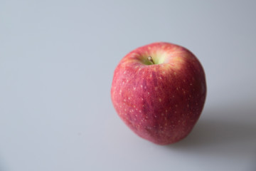  Red ripe apple on a white background