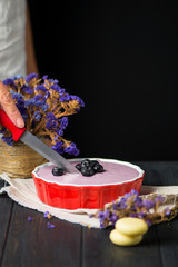 homemade cheesecake with cottage cheese and blueberries, cookies on a wooden background