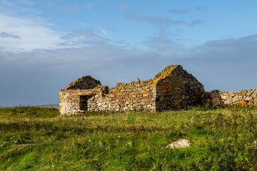A derelict property in ruins, on the Hebridean island of North Uist