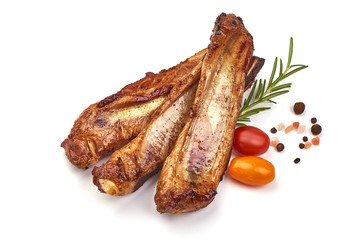 Grilled pork ribs, roasted meat with rosemary and spices, isolated on white background
