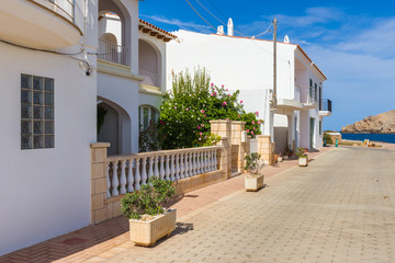 Fototapeta na wymiar Architecture of beautiful Fornells village in the north of Menorca. Baleares, Spain