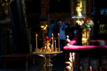 Fototapeta na wymiar Russian Orthodox church. Burning candle