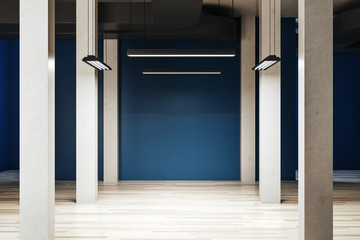 Modern concrete interior with columns and blank blue wall