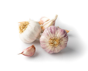 Garlic Heads and Garlic Cloves Isolated on White Background
