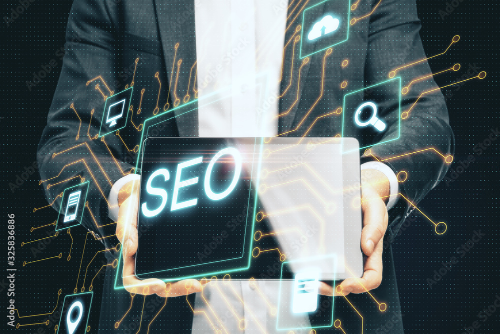 Poster using holding digital tablet with creative digital seo hologram.