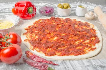 Ingredients for making neapolitan pizza. Prepare Italian pizza raw dough 