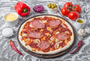Hands prepare of neapolitan pizza, Ingredients for making neapolitan pizza. 