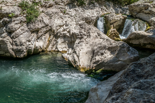 Burano River in Cagli with waterfall and clear water