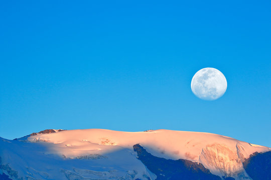 Moon On A Summit Of The Snowy Huaytapallana, Achieved Using A Double Exposure From The Camera.