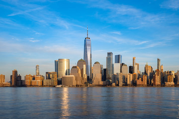Daylight view of  Clouds Moving Over Buildings in Lower Manhattan Financial District Hudson River
