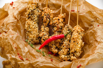 Snack fish in batter with pepper. Concept of catering, hospitality and lifestyle