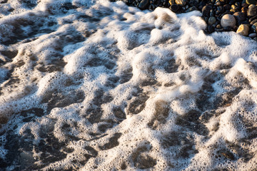 Blurred blue background with waves on top