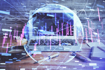 Multi exposure of chart and financial info and work space with computer background. Concept of international online trading.
