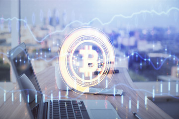 Double exposure of blockchain theme hologram and table with computer background. Concept of bitcoin crypto currency.
