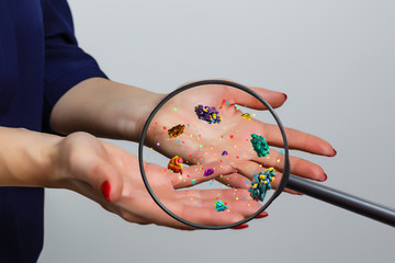 Close up on a sick man hand through magnifying glass transmitting virus by skin contact 3D rendering