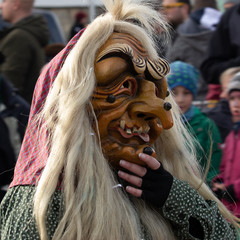 Closeup Portrait of a masked person on a carnival parade