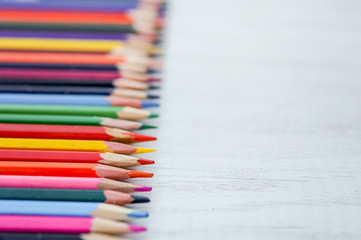 Brand advertising marketing strategy identity business concept. Colorful pencils in a row