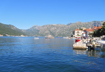 Bay of Kotor ocean and mountain views  and town of Perast in Montengro - 325846654