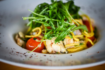 delicious fresh italian pasta with fish & rucola salad