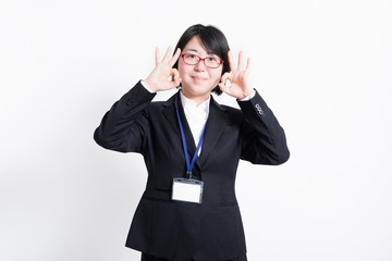 OKサインをするビジネスウーマン