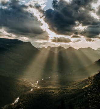 sunbeams and clouds from going to the sun road, glacier park montana