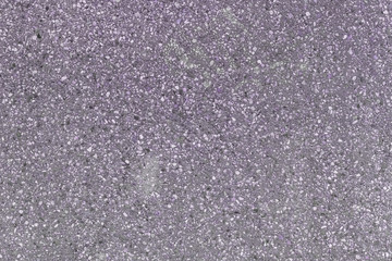 Fragment of asphalt road surface. Toned photo for the site and layouts.